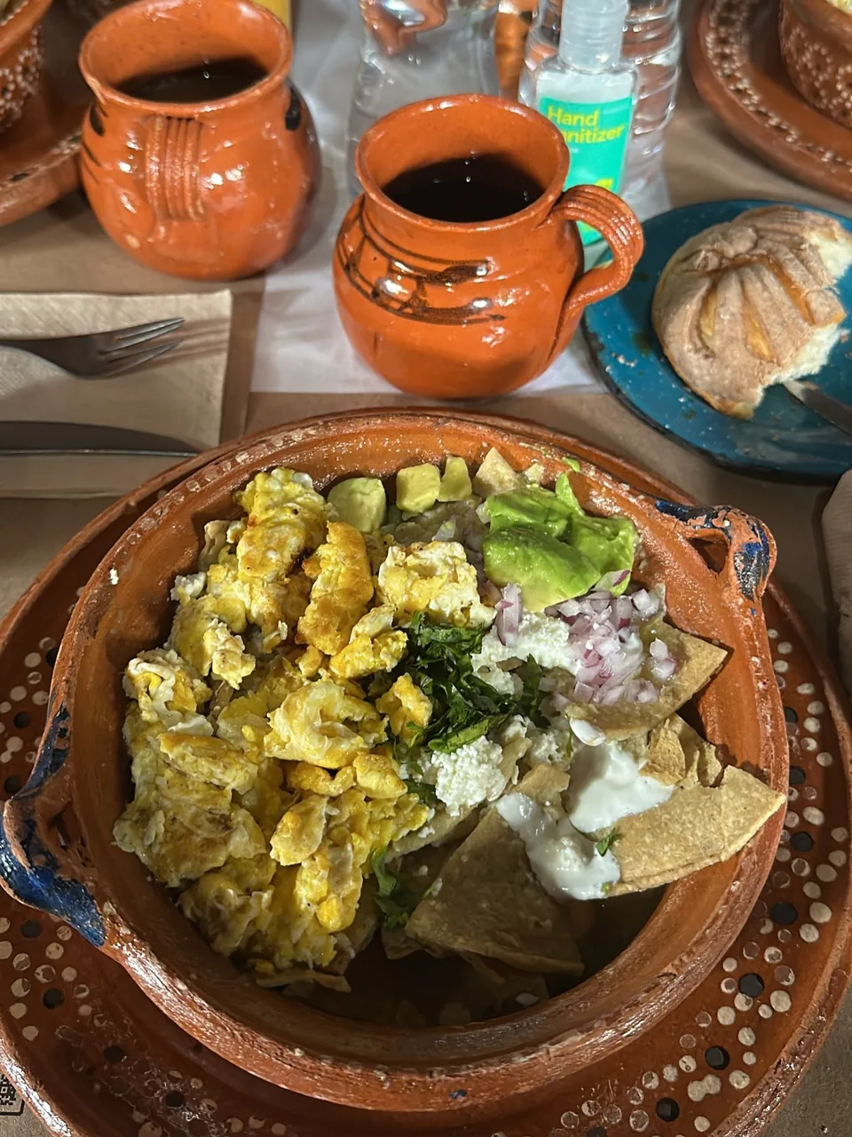 A Mexican breakfast with cafe de olla served in clay mugs at La Gruta Teotihuacan