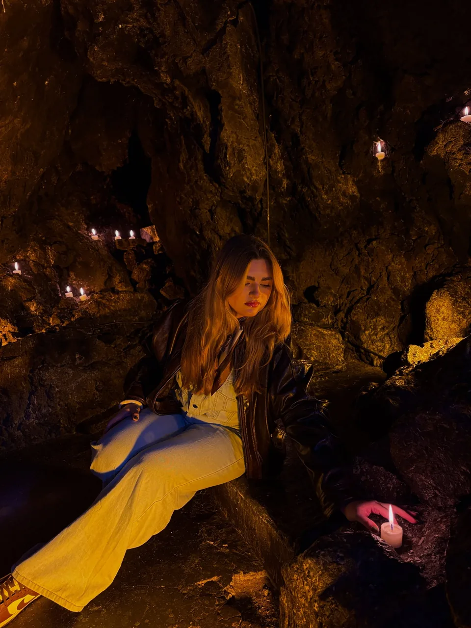 A candlelit corner inside La Gruta Teotihuacan