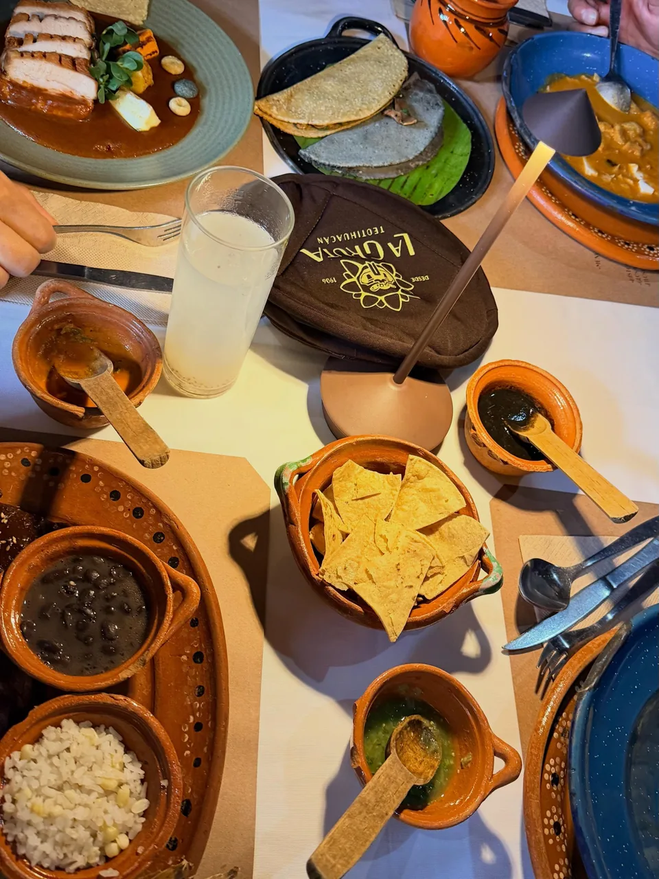 A full traditional Mexican breakfast laid out on the table at La Gruta
